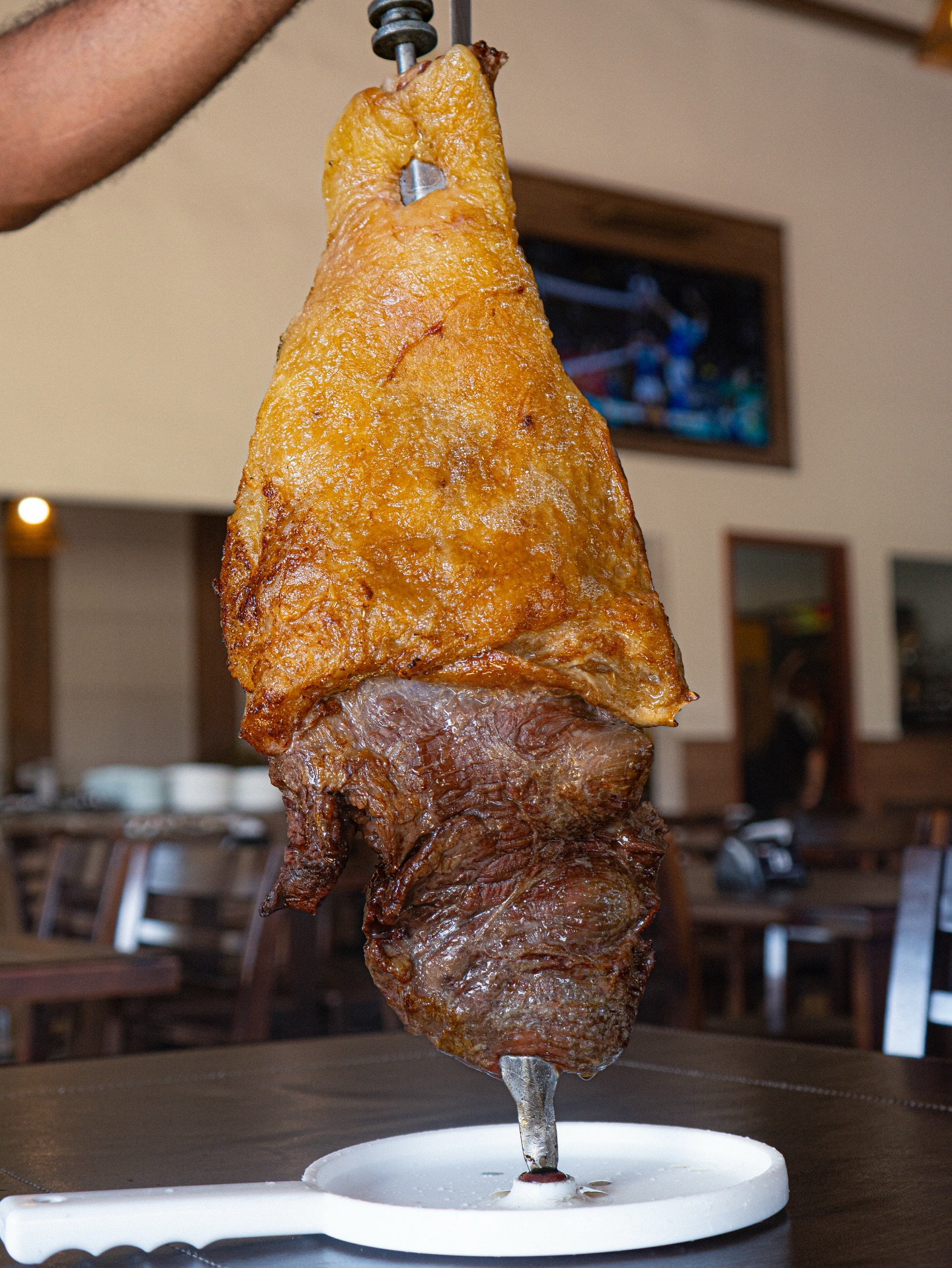 Picanha com capa de gordura no espeto