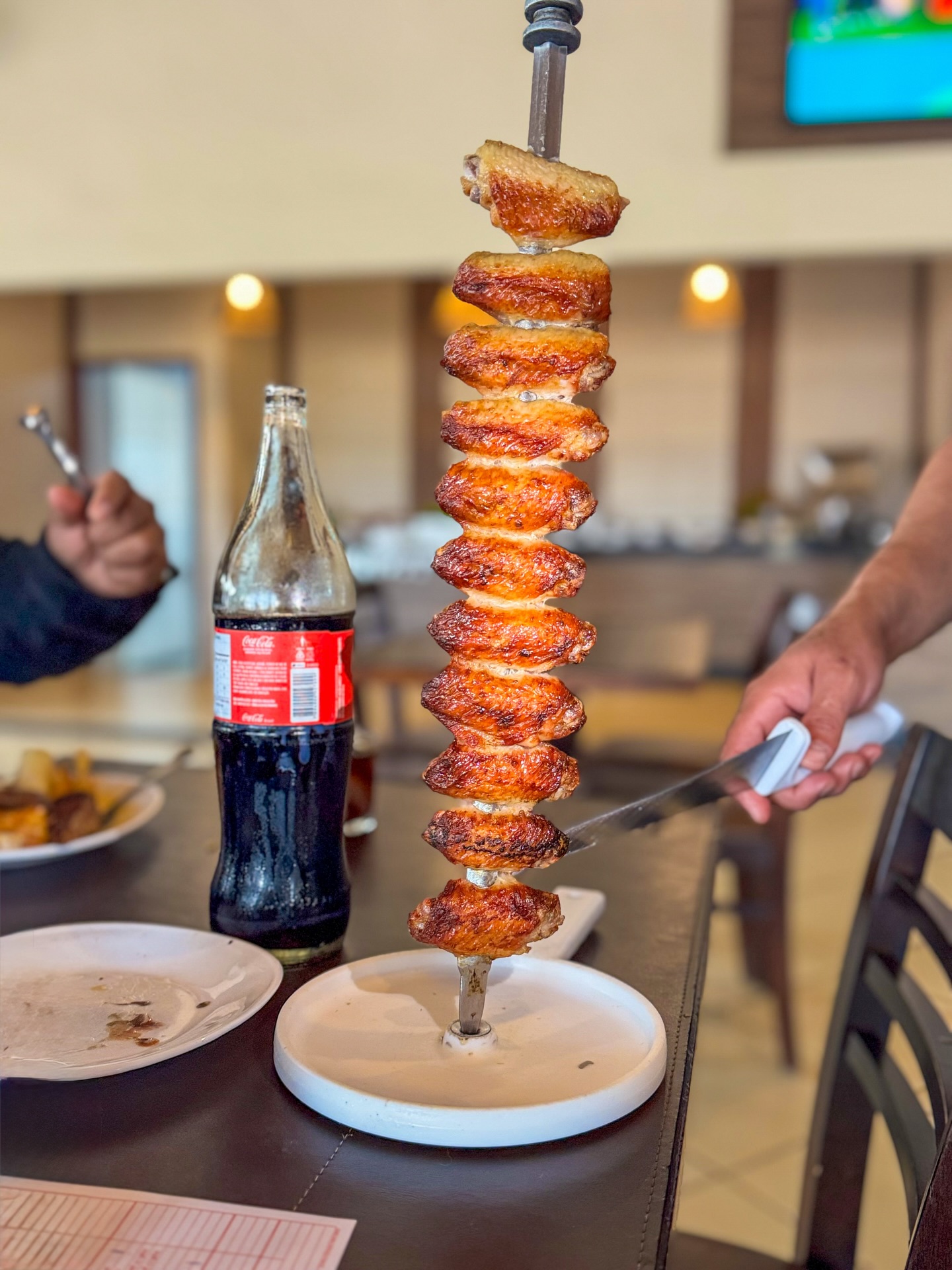 Asas de frango no espeto do rodízio